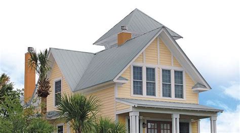 yellow house silver metal roof|yellow metal roof ideas.